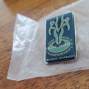 Gold and Black Commemorative Pin.....from Brisbane Ausralia....